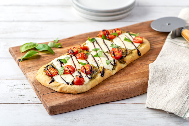 Sundried tomato flatbread on a cutting board