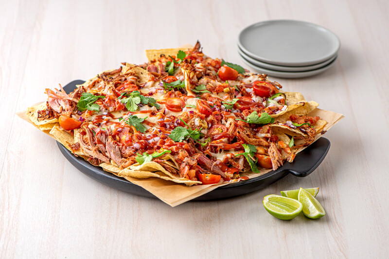 Pulled pork nachos on a plate