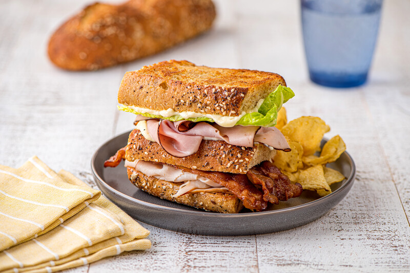 Black Forest ham sandwich on a plate