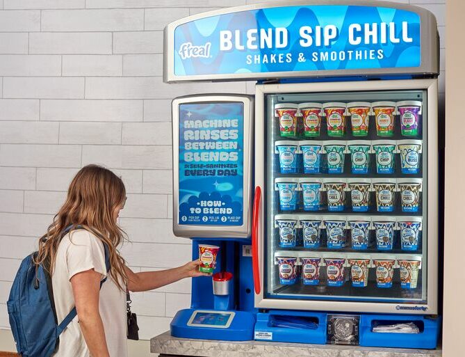 college student blending milkshake