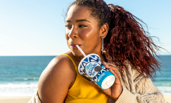 woman drinking freal oreo shake