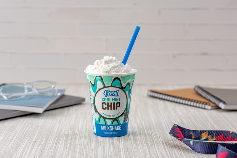 mint freal cup on college desk
