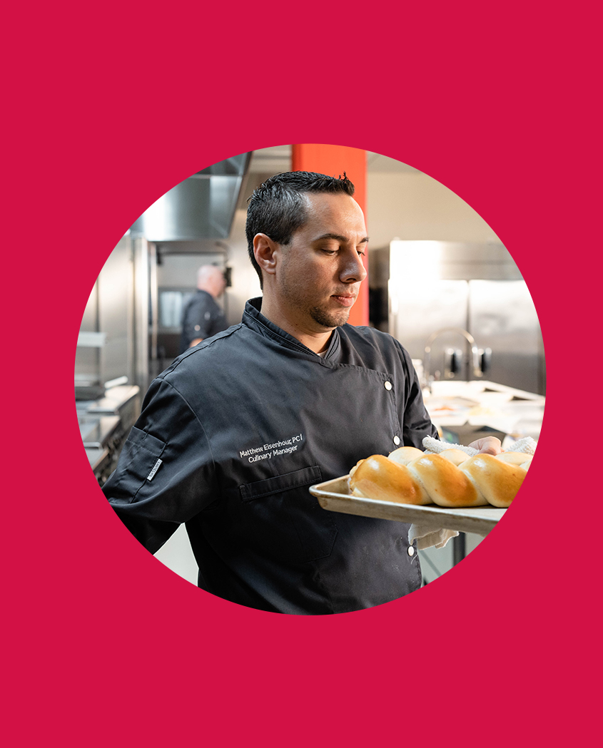 chef with pan of bread